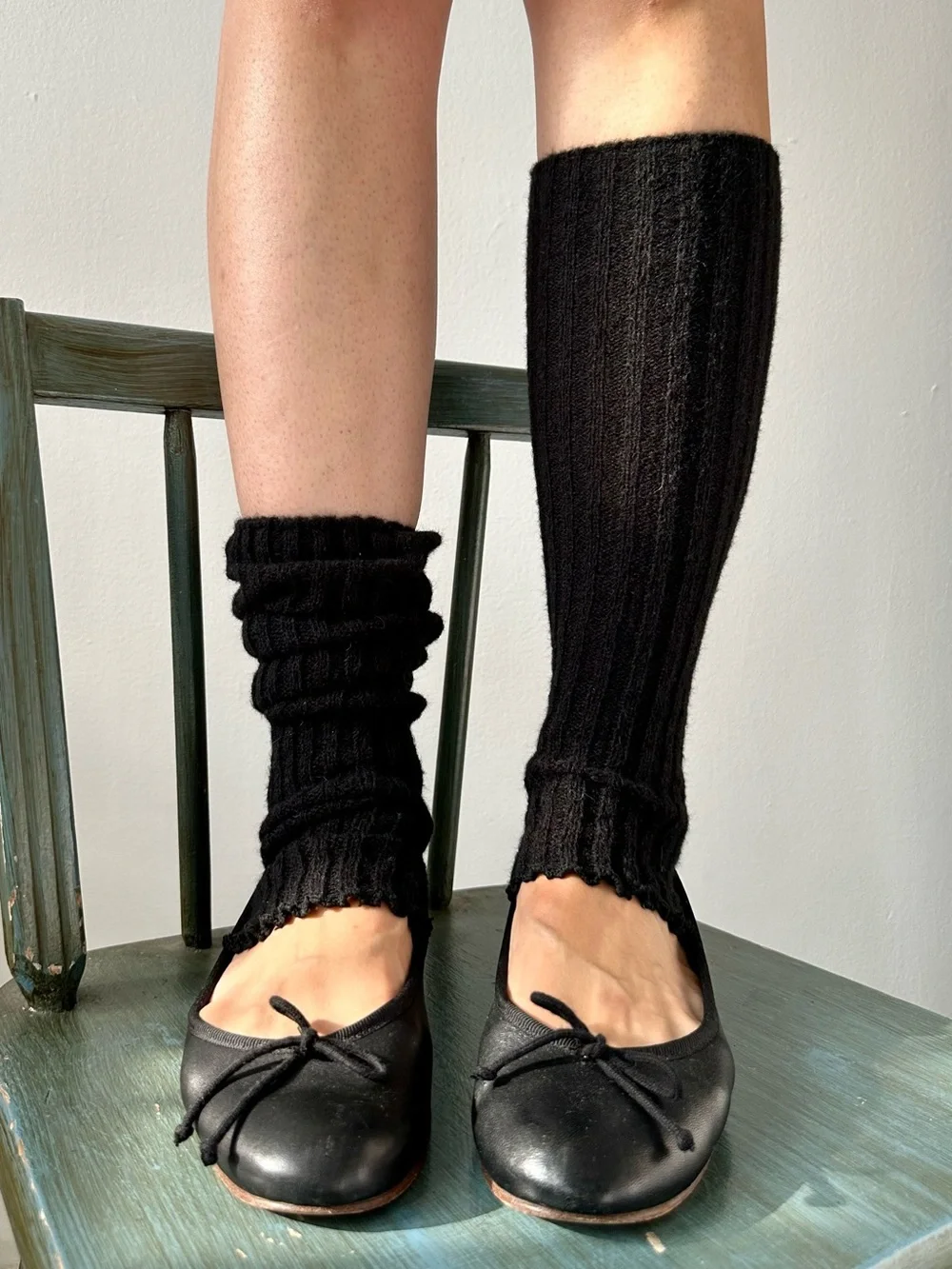 Black acrylic ribbed knit leg warmers